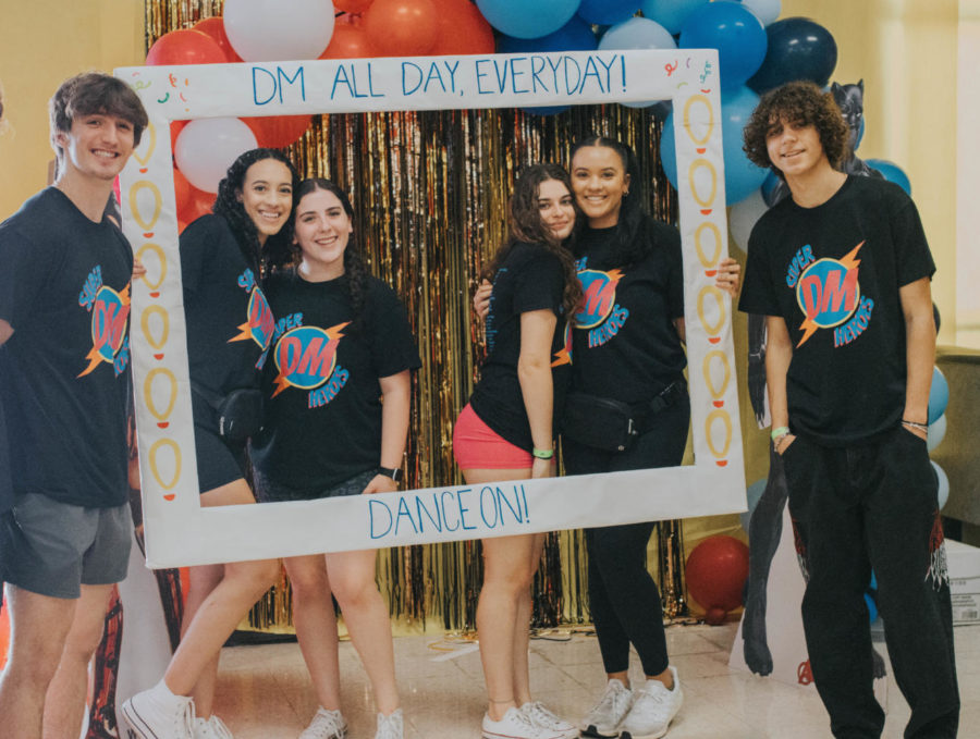 (l to r) Nicholas Giesy, Marayah Phillips, Makayla Milazzo, Isabella Orban, Gabriella Thomas, and Zaxton Sones takes a moment from the dance floor to pose for pictures.