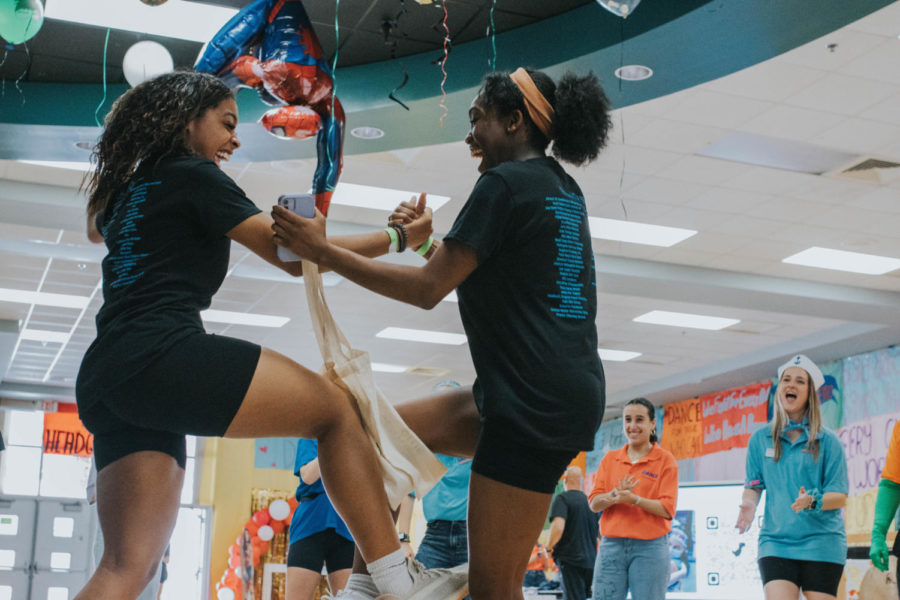 Gabriella Savage and Christine Estime get caught up in the rhythm.